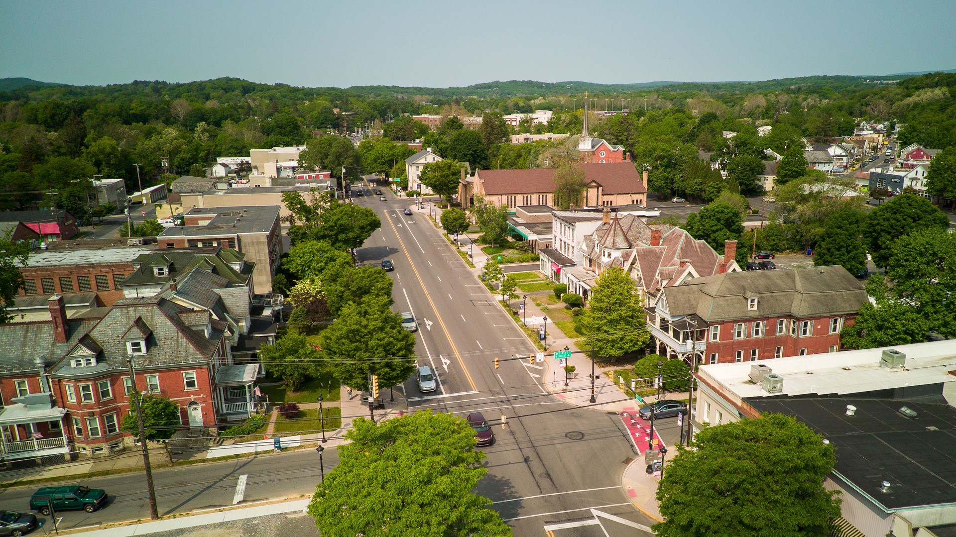 Main Street in Stroudsburg, Pennsylvania. Neighborhood with residential houses and municipal buildings. Aerial drone view